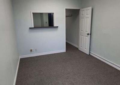 Interior of unfurnished office room with neutral walls at Burlington Office Centre Burlington ON.