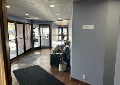 Private office space with pass-through window ideal for small professional firm at Burlington Office Centre.