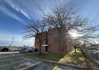 Exterior of Burlington Office Centre brick office building with parking at 2349 Fairview Street Burlington ON.