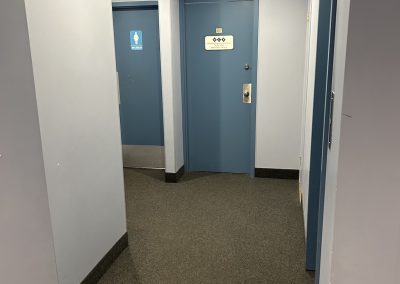 Quiet interior corridor leading to small office suites at Burlington Office Centre Burlington ON.