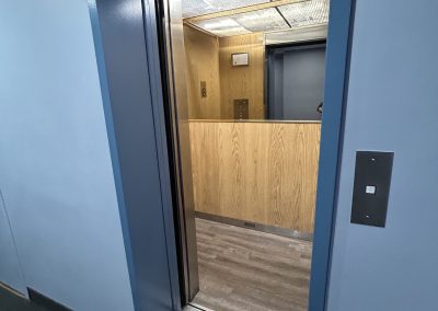Modern elevator interior at Burlington Office Centre, 2349 Fairview Street Burlington ON – small office building.